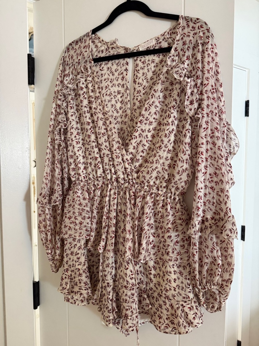 Blush Cream romper with Rose Print and Ruffle Details